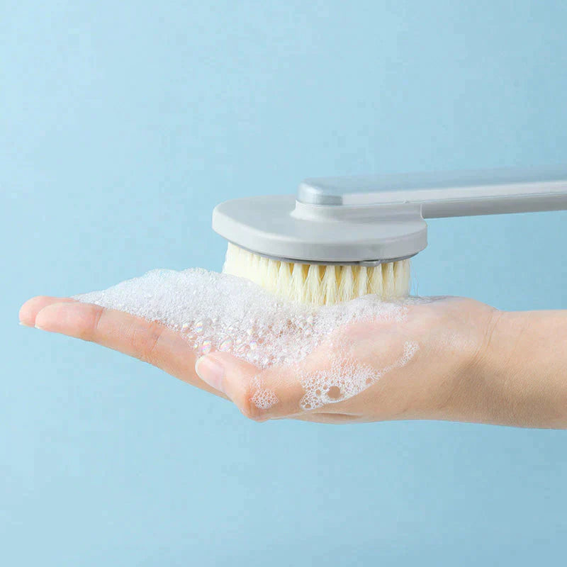 Brosse de massage et bain à manche long