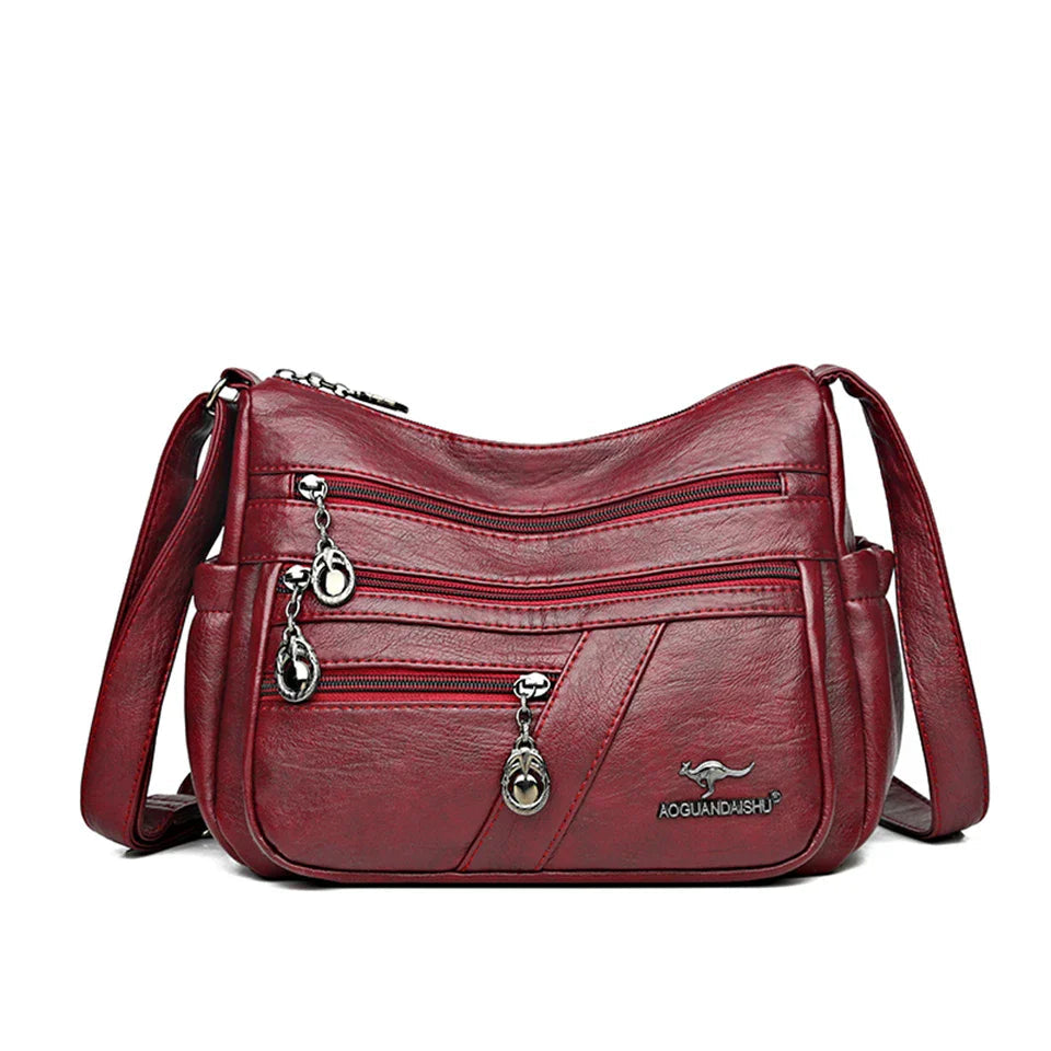 Bolso bandolera de piel sintética suave - Multibolsillo