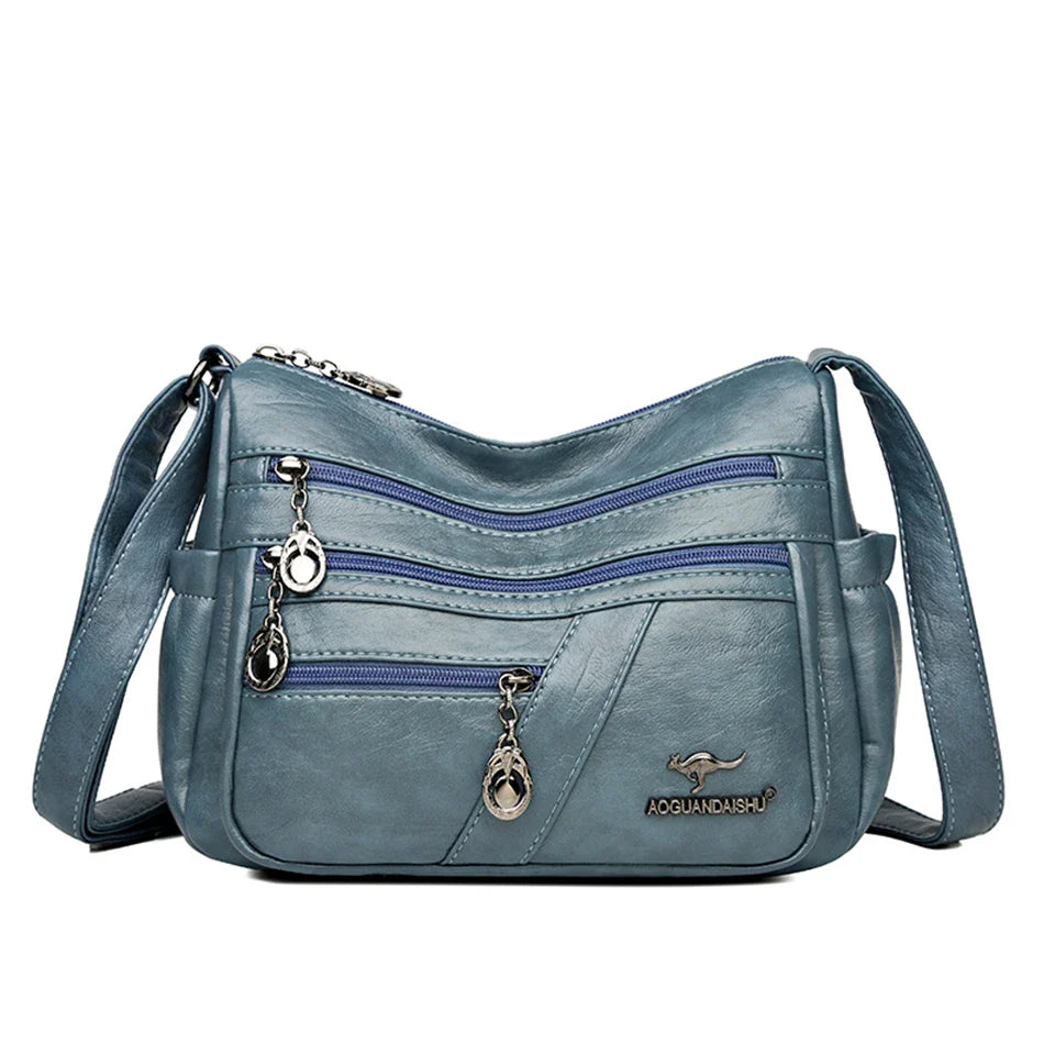 Bolso bandolera de piel sintética suave - Multibolsillo
